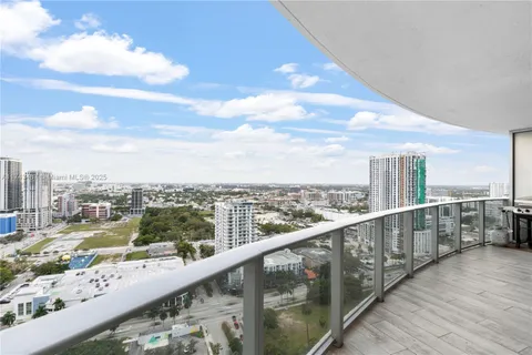 a view of city from a balcony