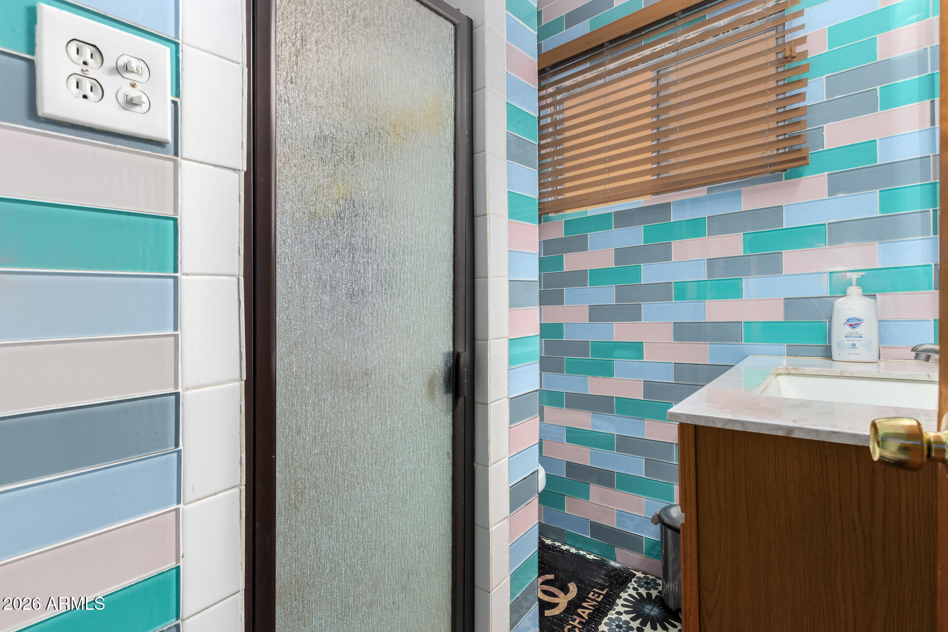 2825 North 33rd Place Phoenix, AZ 85008 - Photo 23 of 27 a bathroom with a sink and a shower