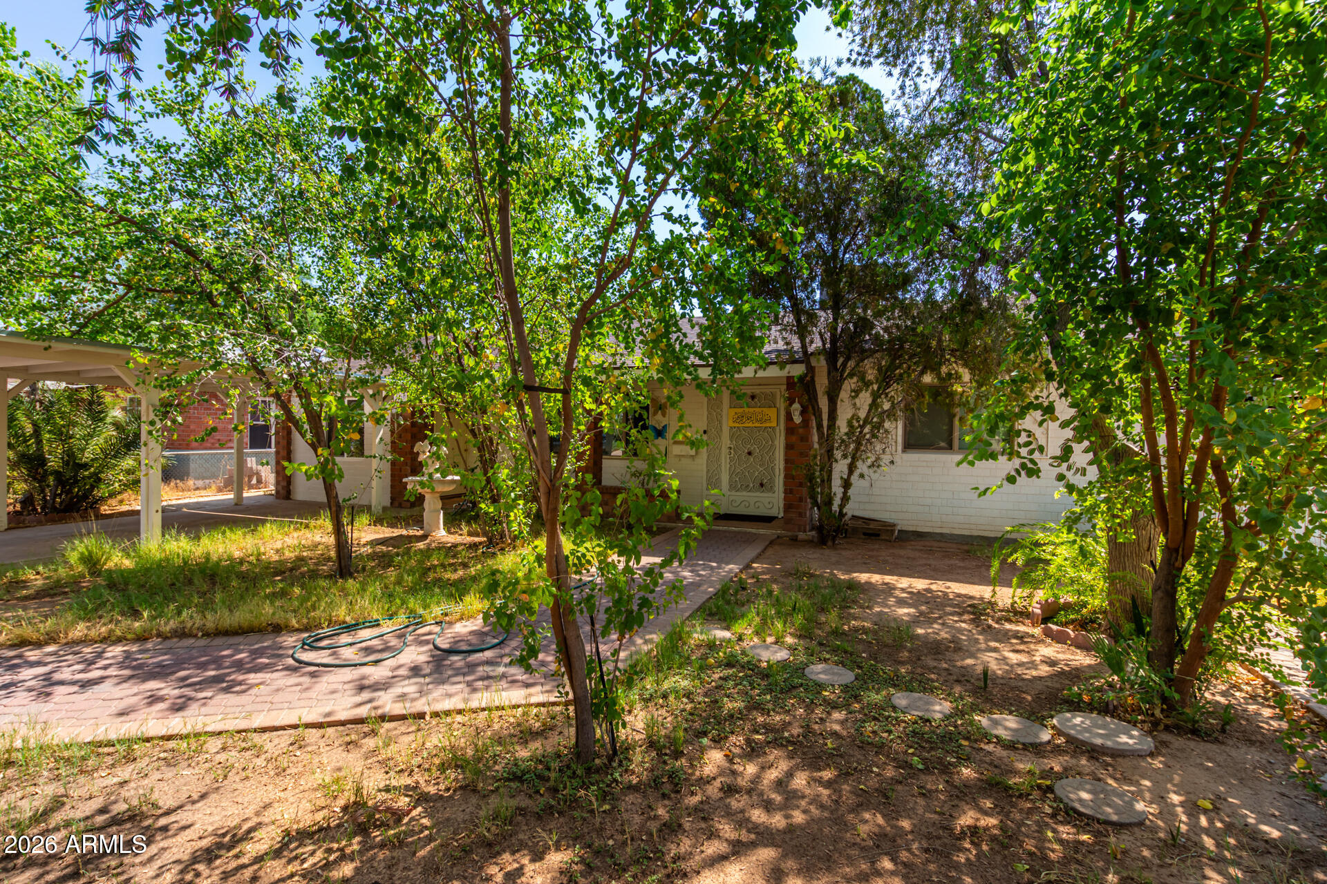 2825 North 33rd Place Phoenix, AZ 85008 - Photo 3 of 27 a view of backyard of house with green space