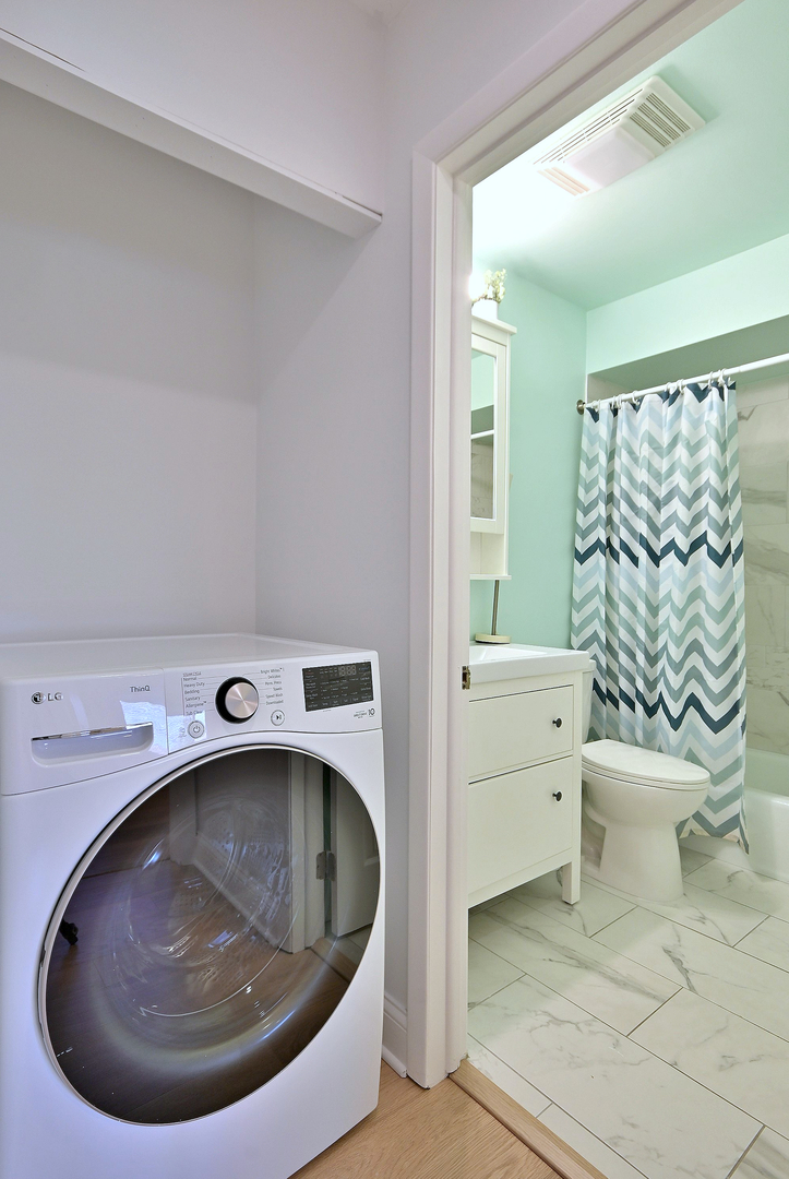 836 East Old Willow Road, Unit 211 Prospect Heights, IL 60070 - Photo 17 of 28 a utility room with a toilet and sink