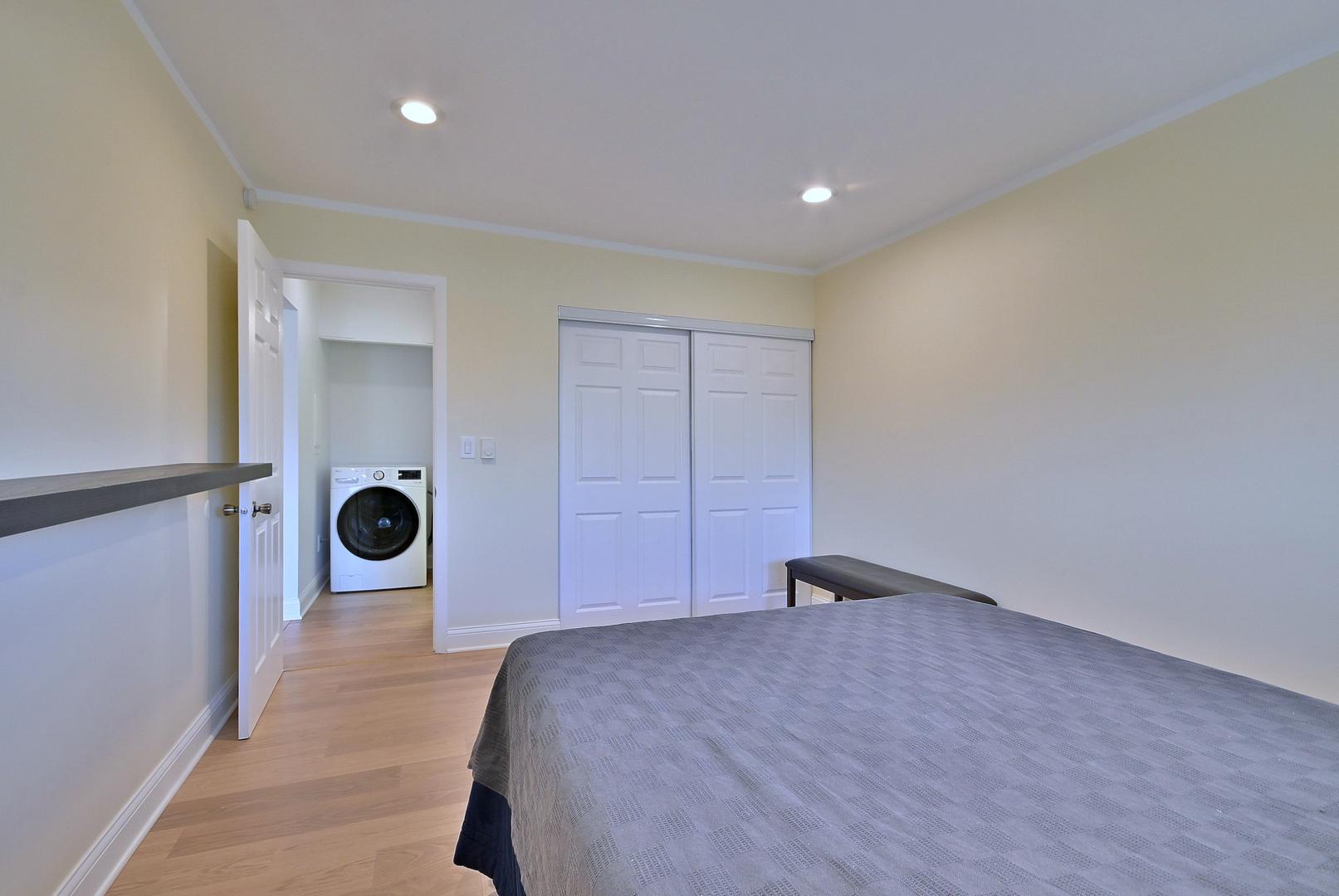 836 East Old Willow Road, Unit 211 Prospect Heights, IL 60070 - Photo 19 of 28 a bedroom with a bed and cabinets