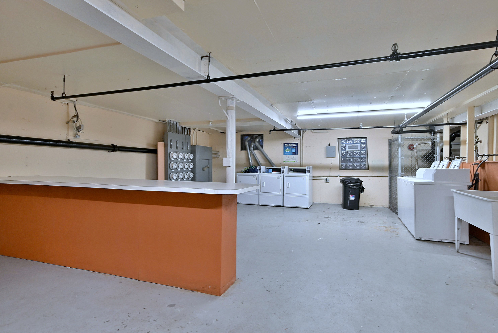 836 East Old Willow Road, Unit 211 Prospect Heights, IL 60070 - Photo 27 of 28 a living room with furniture and kitchen view