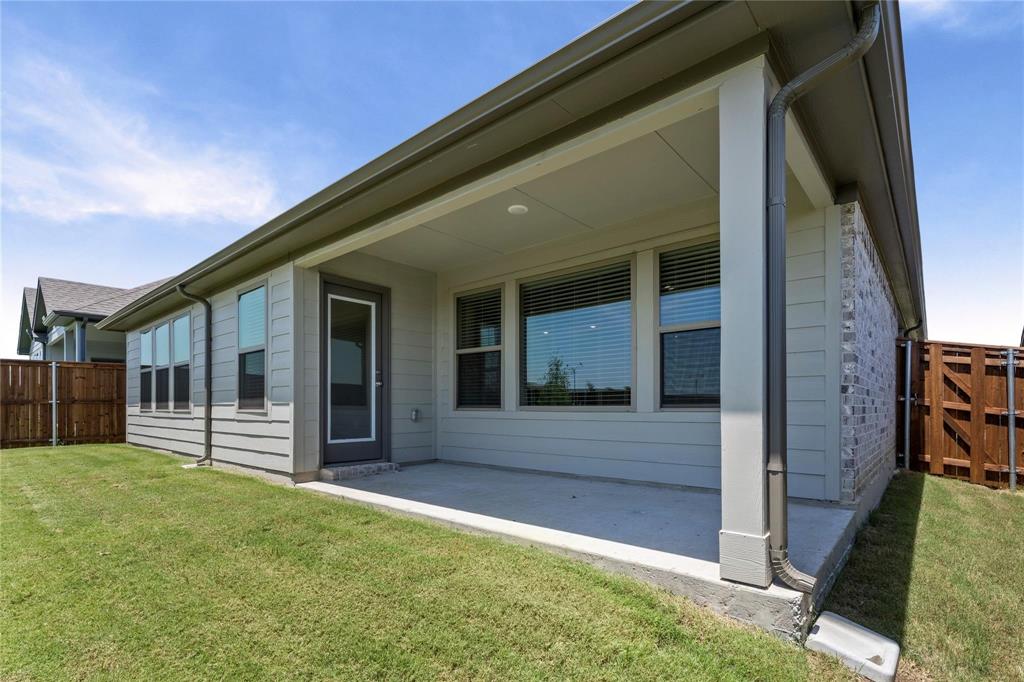 507 Avocet Road Princeton, TX 75407 - Photo 31 of 31 Covered patio with a concrete surface, exterior siding, and brick accents