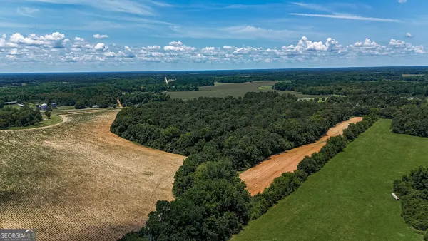 a view of a lake with a big yard