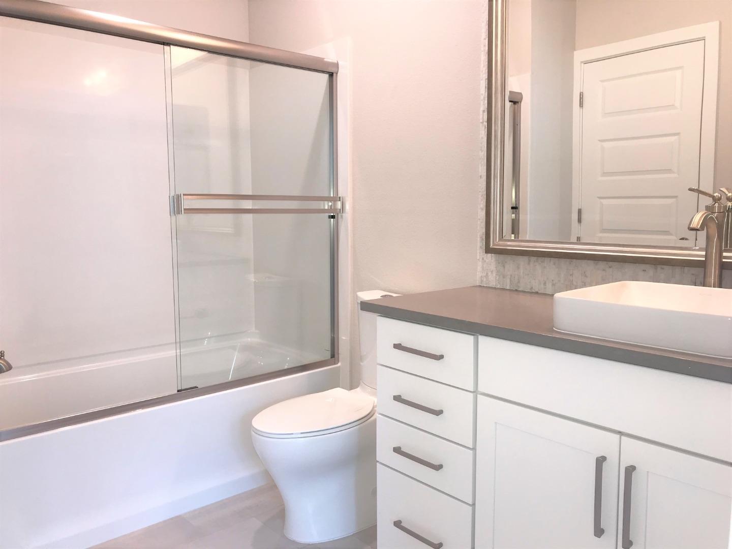 1506 Cherry Circle Milpitas, CA 95035 - Photo 5 of 12 a bathroom with a sink a toilet and shower