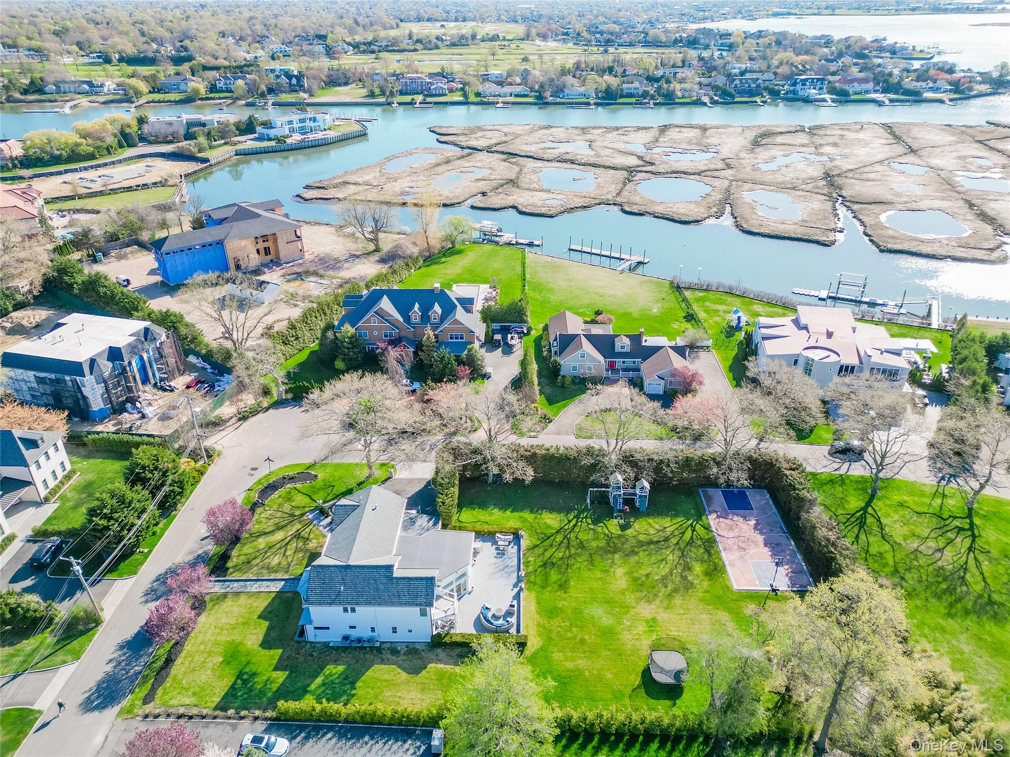 315 Hewlett Neck Road Woodmere, NY 11598 - Photo 35 of 37 an aerial view of a swimming pool yard and ocean view