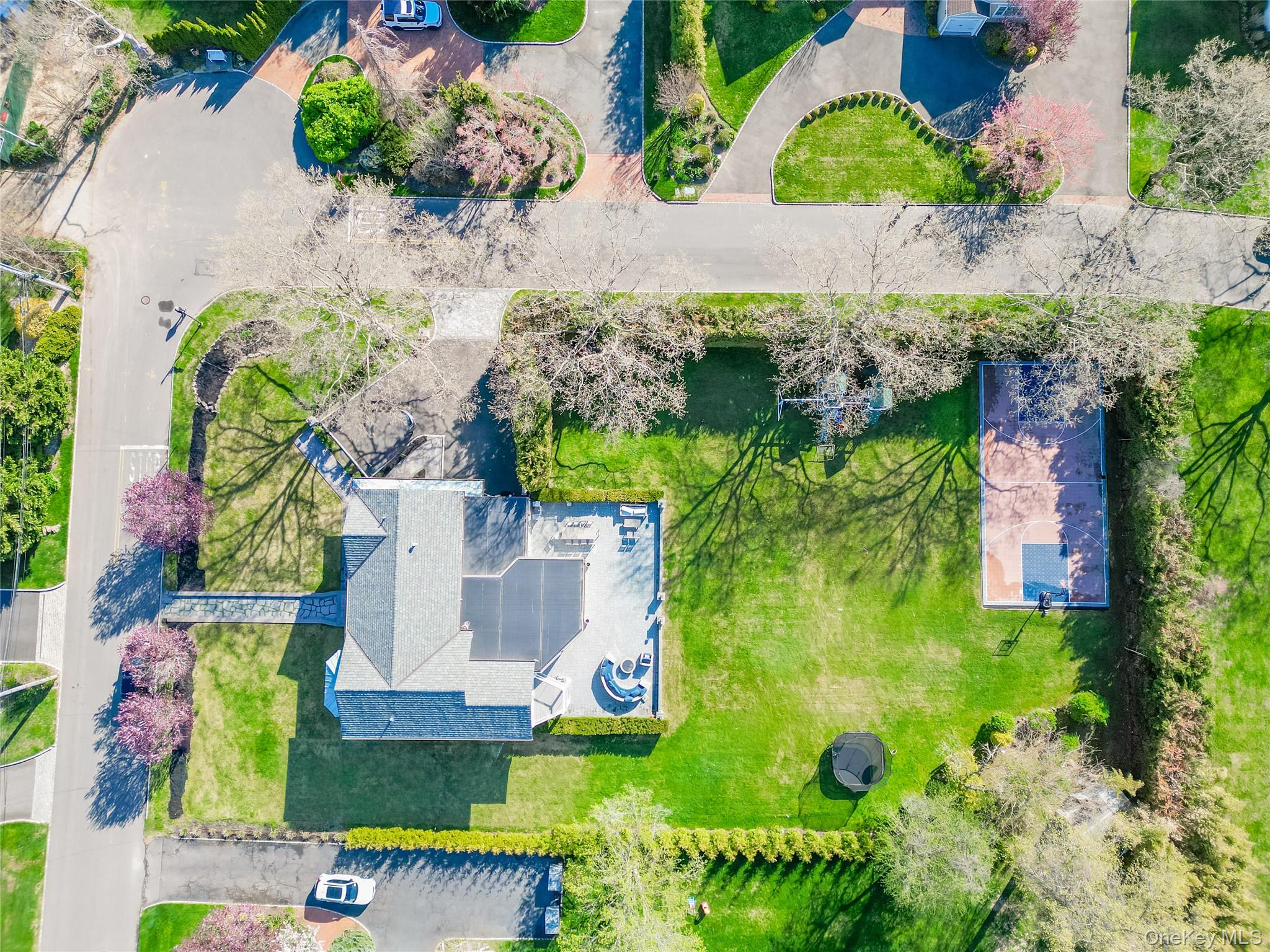 315 Hewlett Neck Road Woodmere, NY 11598 - Photo 37 of 37 an aerial view of residential house with yard and swimming pool