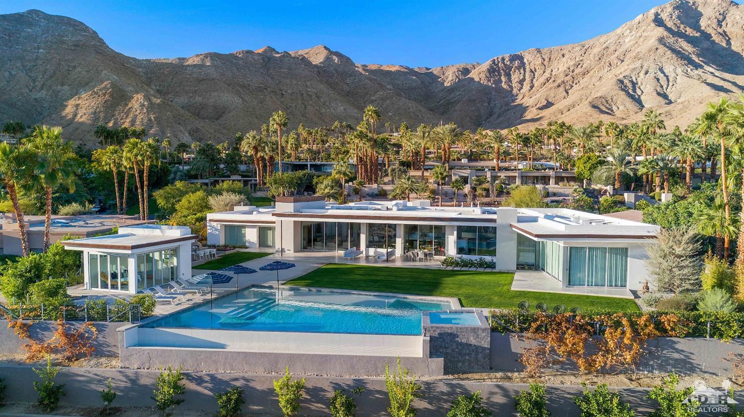 an aerial view of a house with a garden