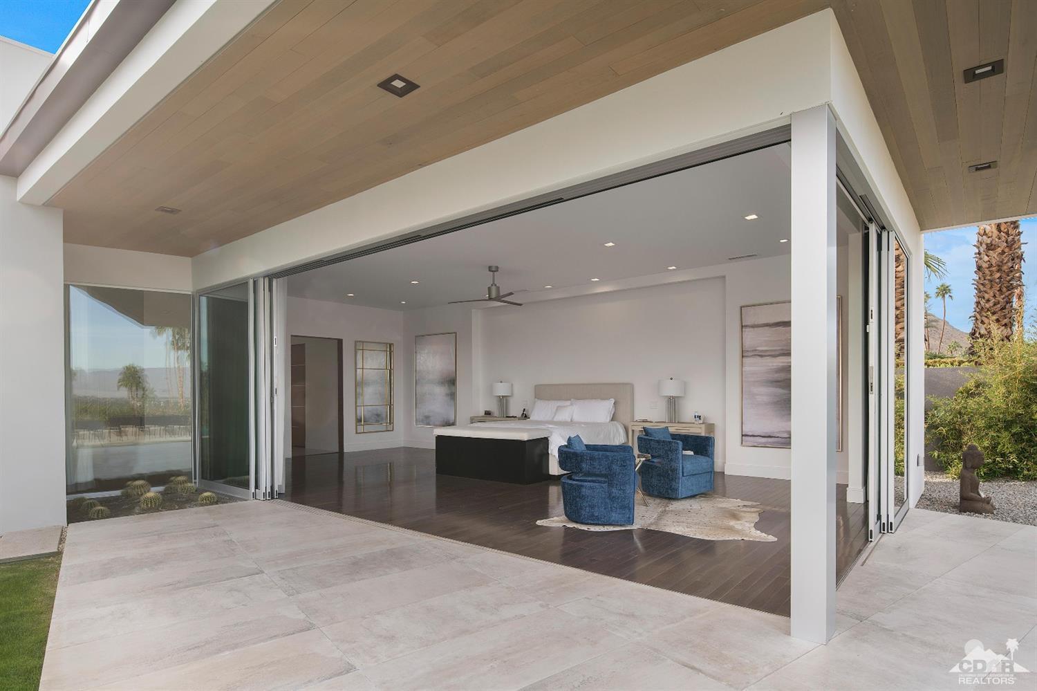 70262 Sonora Road Rancho Mirage, CA 92270 - Photo 12 of 24 a view of a living room and kitchen with furniture