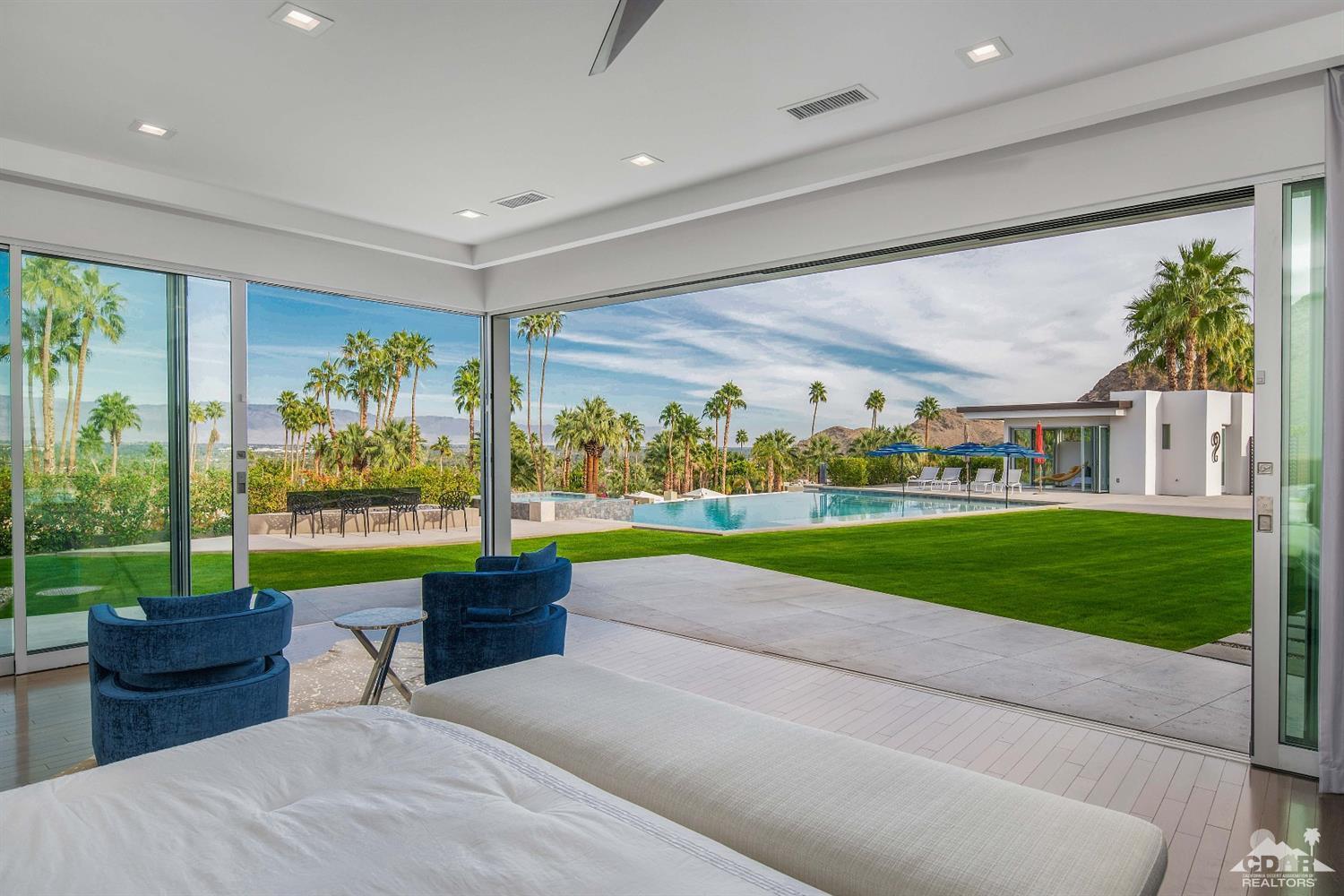 70262 Sonora Road Rancho Mirage, CA 92270 - Photo 13 of 24 a room with garden view and a yard