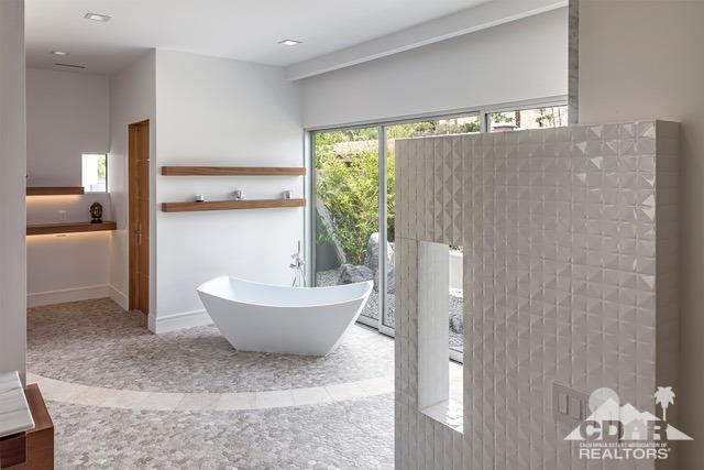 70262 Sonora Road Rancho Mirage, CA 92270 - Photo 14 of 24 a spacious bathroom with a bathtub and shower