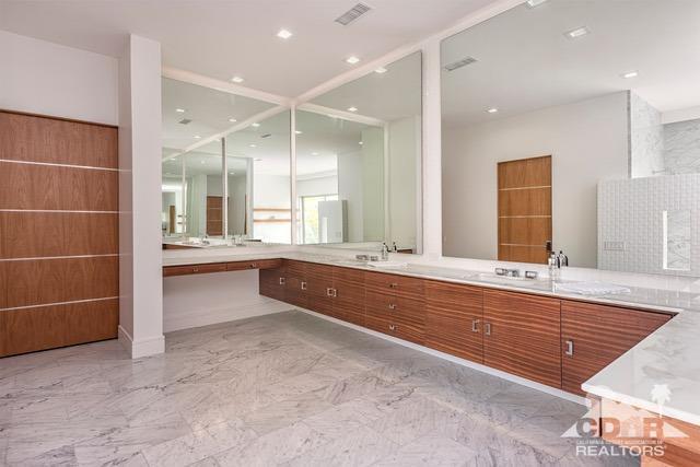 70262 Sonora Road Rancho Mirage, CA 92270 - Photo 16 of 24 a large bathroom with a large tub and sink