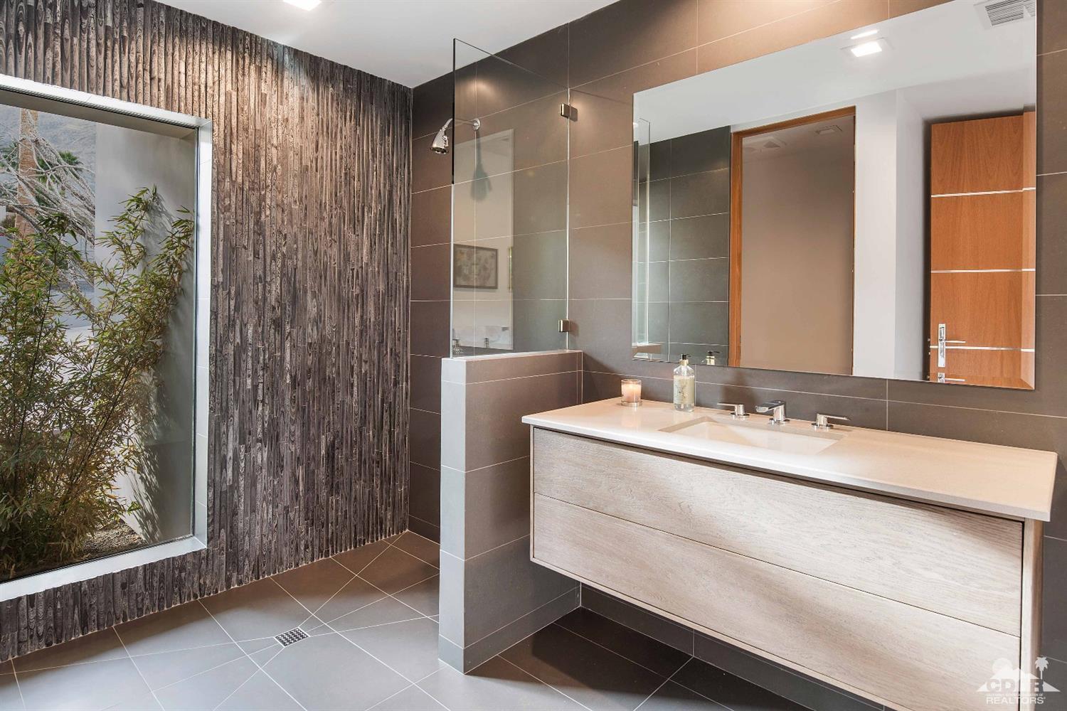 70262 Sonora Road Rancho Mirage, CA 92270 - Photo 19 of 24 a bathroom with a sink and a mirror