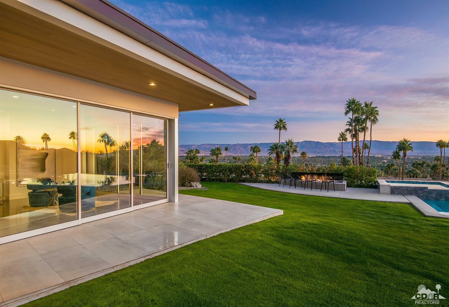 70262 Sonora Road Rancho Mirage, CA 92270 - Photo 22 of 24 a view of a backyard with a garden and plants