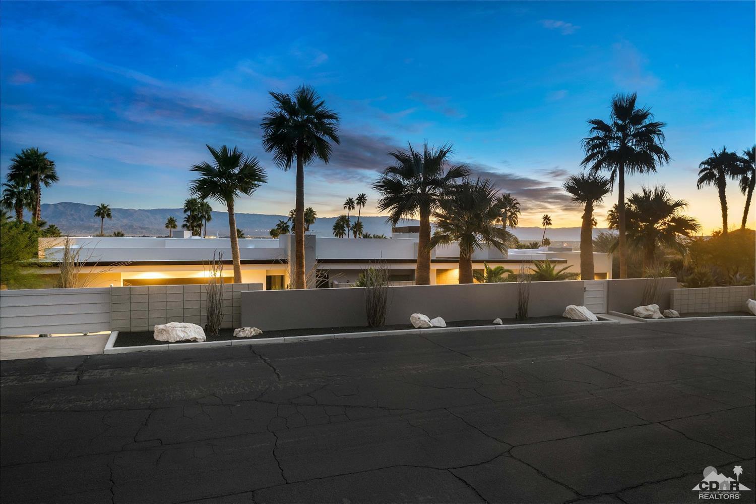 70262 Sonora Road Rancho Mirage, CA 92270 - Photo 24 of 24 a view of a swimming pool with a table and chairs