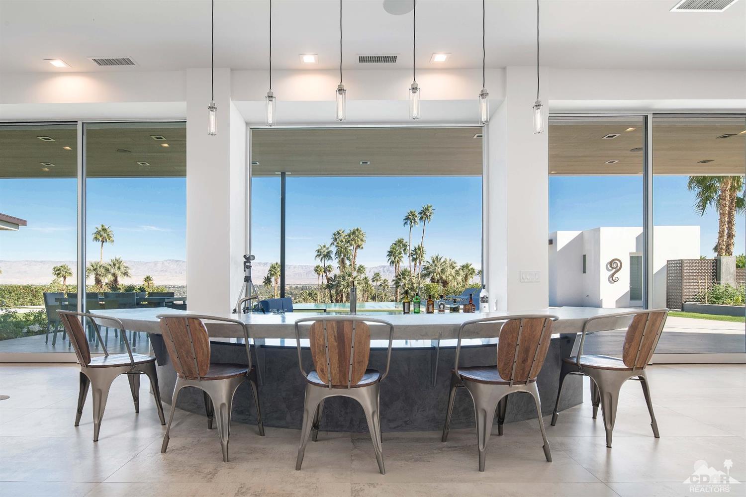70262 Sonora Road Rancho Mirage, CA 92270 - Photo 8 of 24 a dining room with furniture and window