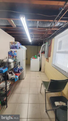 a bedroom with a bed and a cabinets