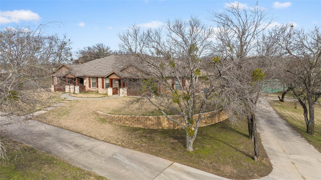 892 West First Street Maypearl, TX 76064 - Photo 3 of 18 a view of back yard of the house