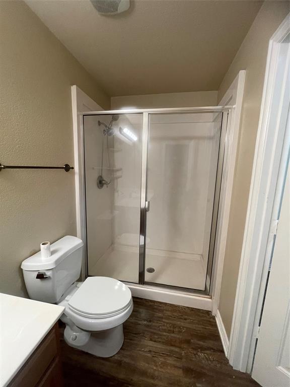892 West First Street Maypearl, TX 76064 - Photo 10 of 18 a bathroom with a toilet and a shower
