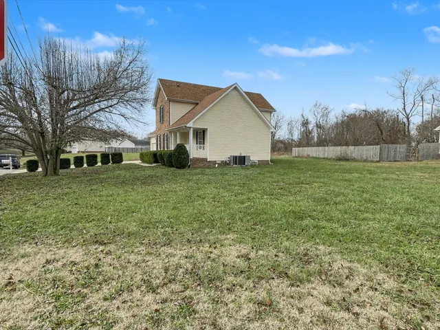 a house view with a garden space