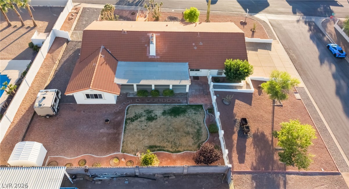 429 Crestway Road Henderson, NV 89015 - Photo 51 of 56 An aerial view showcases the property's unique roofline and arid landscaping, complete with a private backyard oasis.