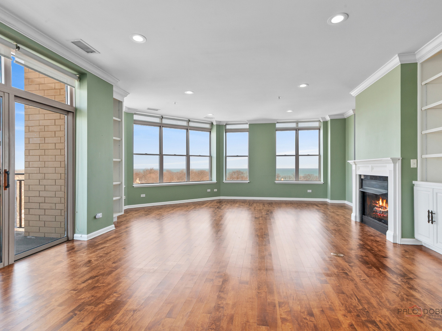 3535 Patten Road, Unit 6E Highland Park, IL 60035 - Photo 19 of 47 a view of an empty room with window and wooden floor