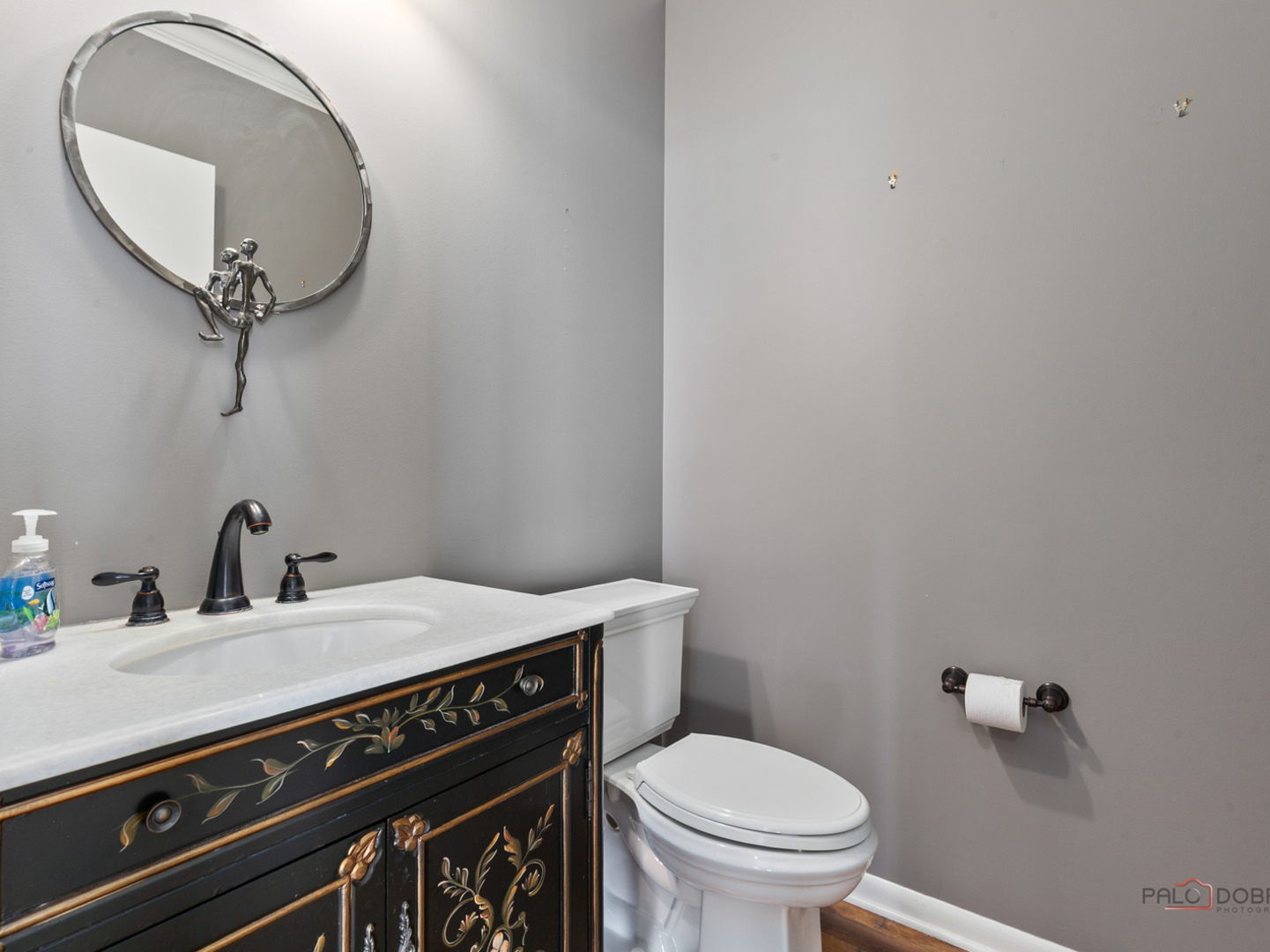 3535 Patten Road, Unit 6E Highland Park, IL 60035 - Photo 24 of 47 a bathroom with a sink a toilet and a mirror
