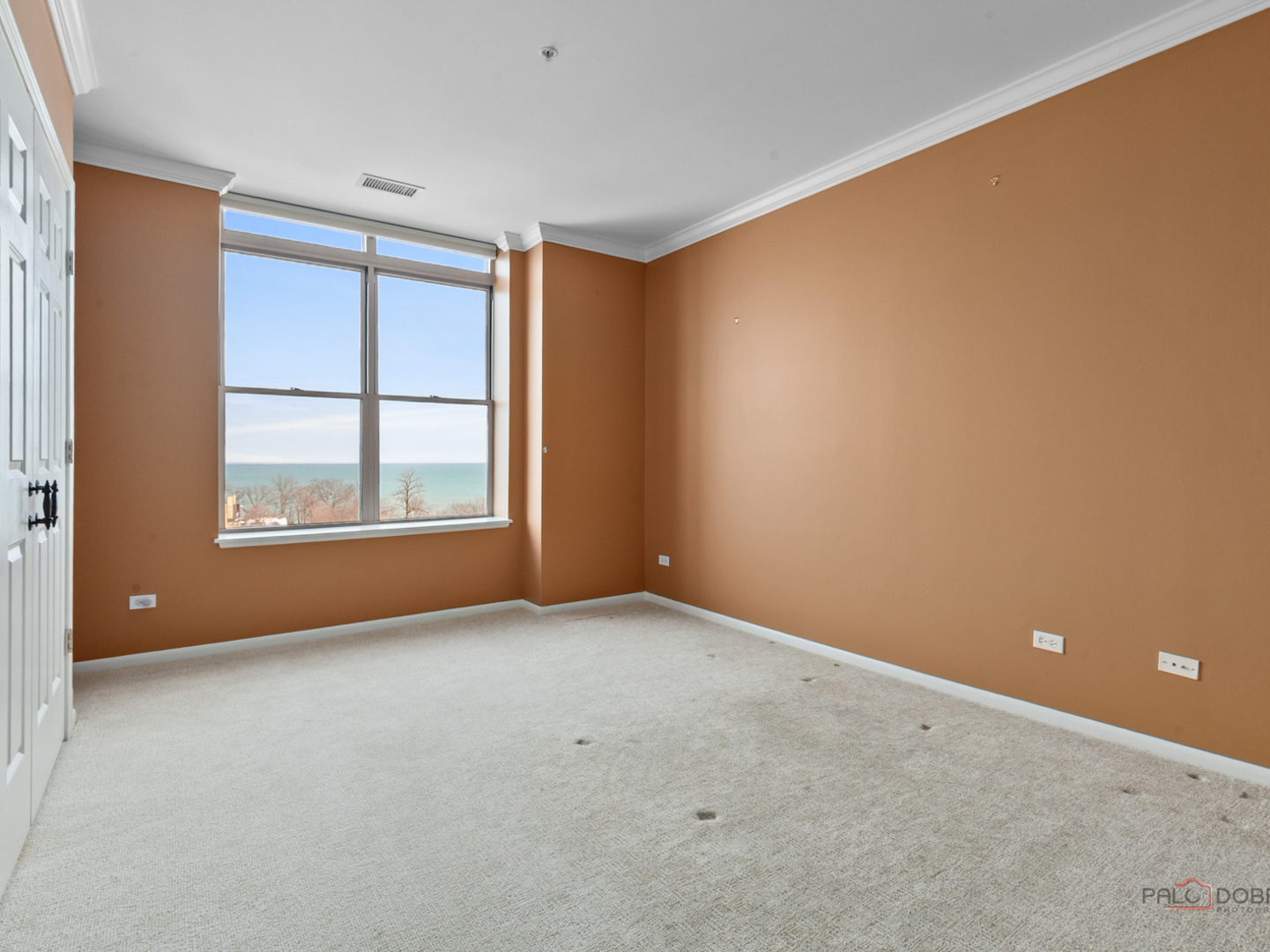 3535 Patten Road, Unit 6E Highland Park, IL 60035 - Photo 36 of 47 an empty room with windows and closet