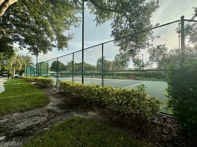 1210 Reserve Way, Unit 9107 Naples, FL 34105 - Photo 17 of 22 a view of a park with large trees
