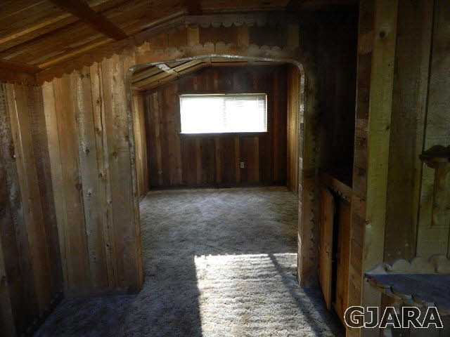 2398 H Road Grand Junction, CO 81505 - Photo 5 of 7 a view of a hallway with wooden floor
