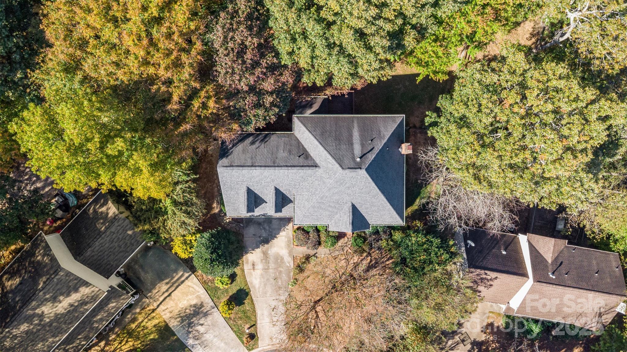 2507 Bathgate Lane Matthews, NC 28105 - Photo 2 of 36 an aerial view of a house with yard and swimming pool