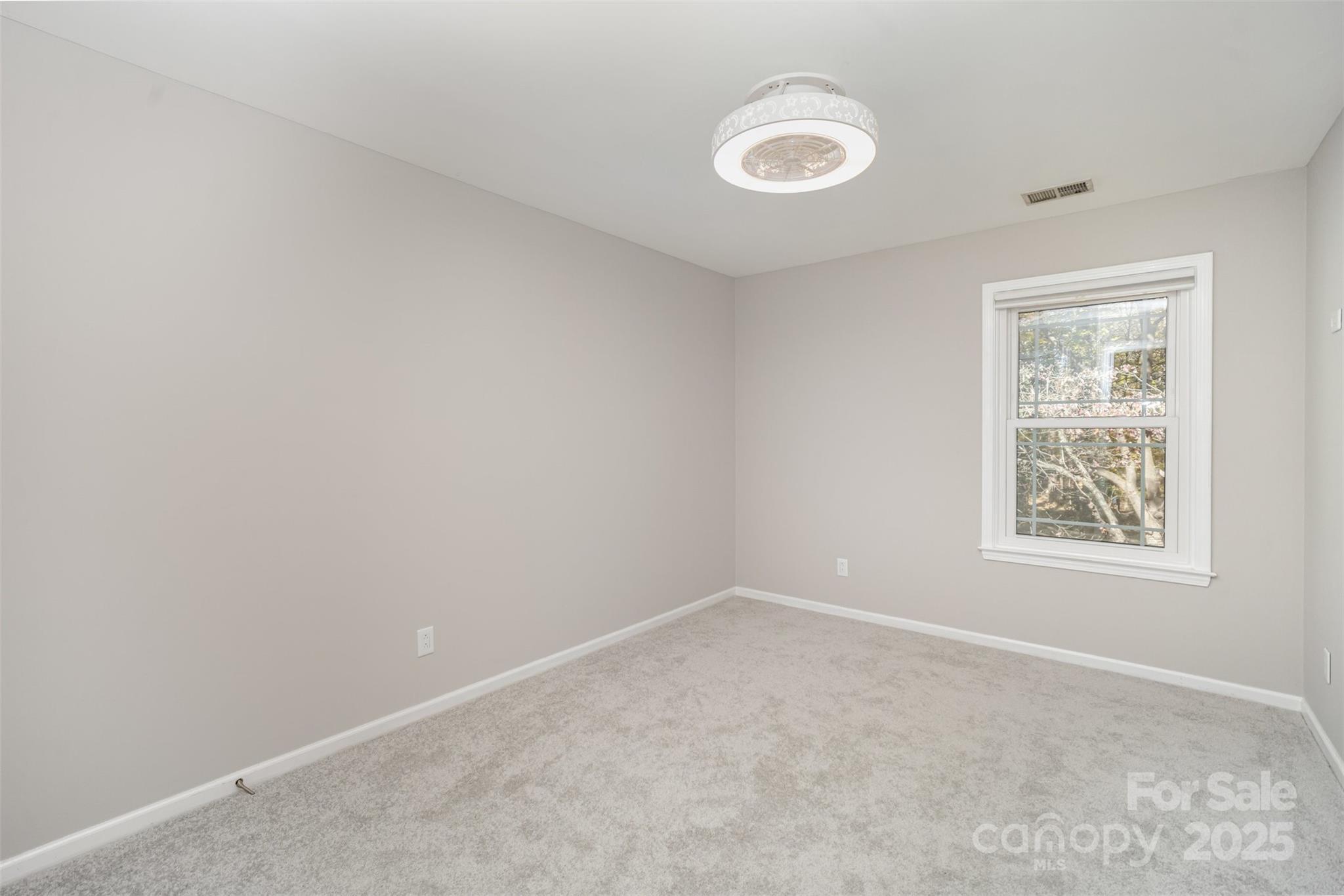 2507 Bathgate Lane Matthews, NC 28105 - Photo 25 of 36 an empty room with windows