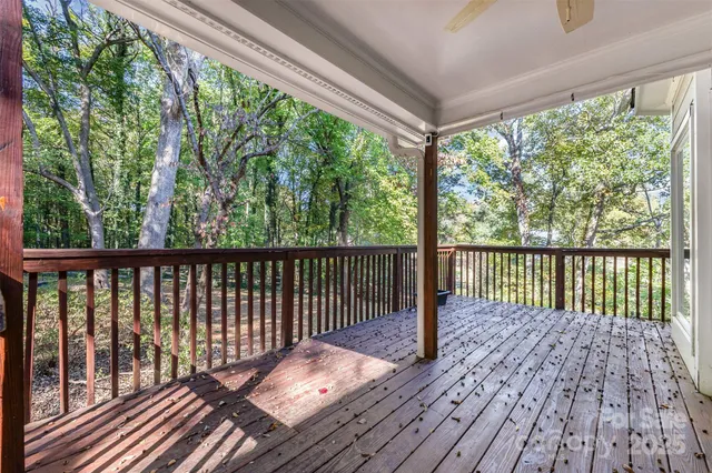 a view of balcony with wooden floor