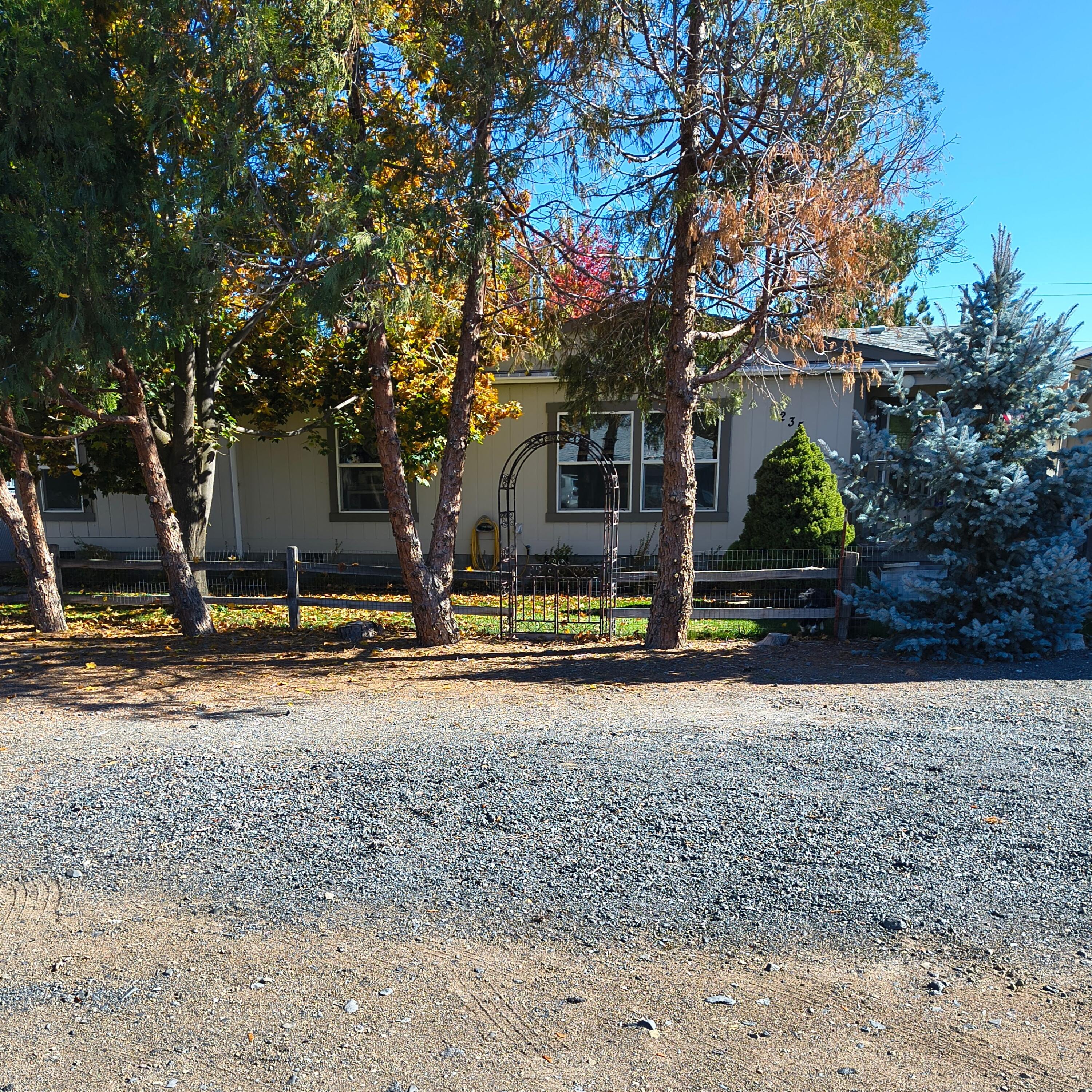 235 North Roosevelt Street Merrill, OR 97633 - Photo 1 of 27 a view of a house with snow on the road