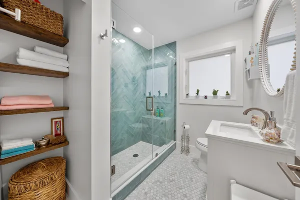 a bedroom with a bed and a table