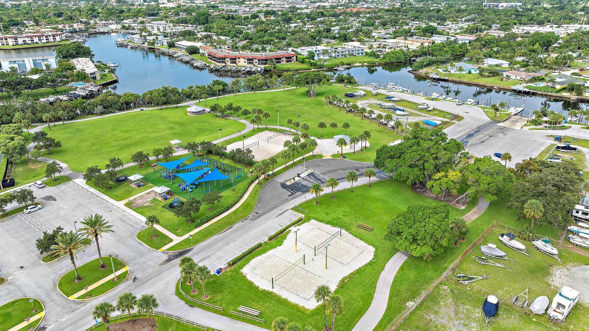 517 Gulf Road North Palm Beach, FL 33408 - Photo 44 of 59 an aerial view of a pool yard swimming pool and outdoor seating