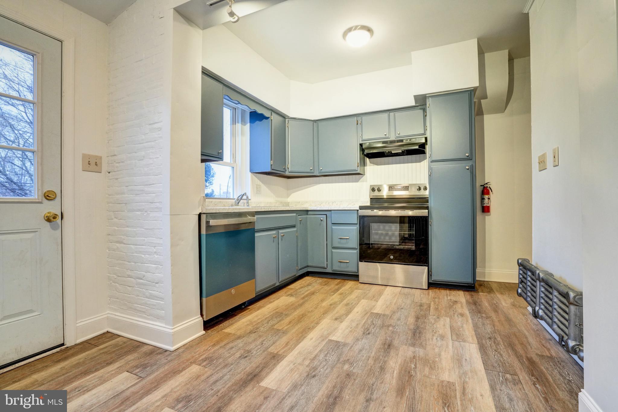 642 Walnut Street Pottstown, PA 19464 - Photo 7 of 23 Bright kitchen with sleek cabinetry.