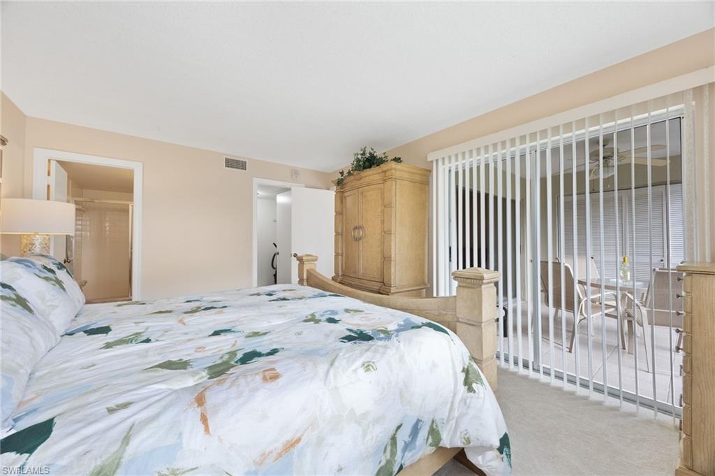 5683 Rattlesnake Hammock Road, Unit A202 Naples, FL 34113 - Photo 15 of 27 MB with sliding doors to Lanai