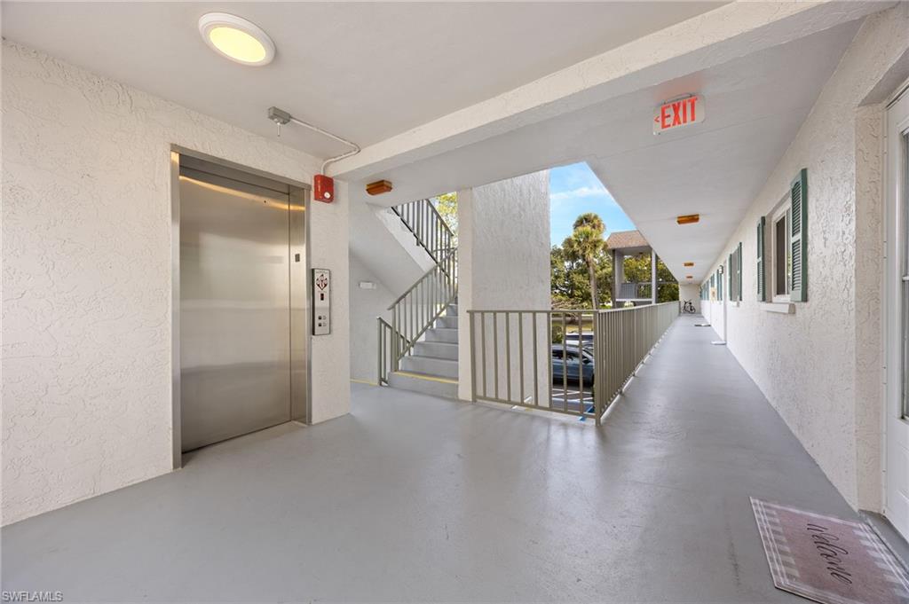 5683 Rattlesnake Hammock Road, Unit A202 Naples, FL 34113 - Photo 25 of 27 Elevator is only a short walk to 202A