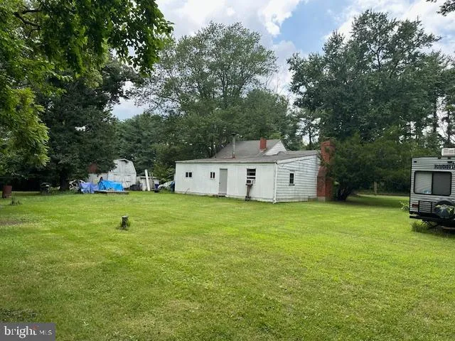 a swimming pool with wooden fence