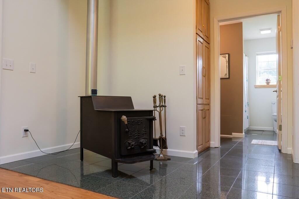 1518 Cummingsville And Sparkman Road Doyle, TN 38559 - Photo 16 of 58 a view of a hallway with wooden floor and furniture