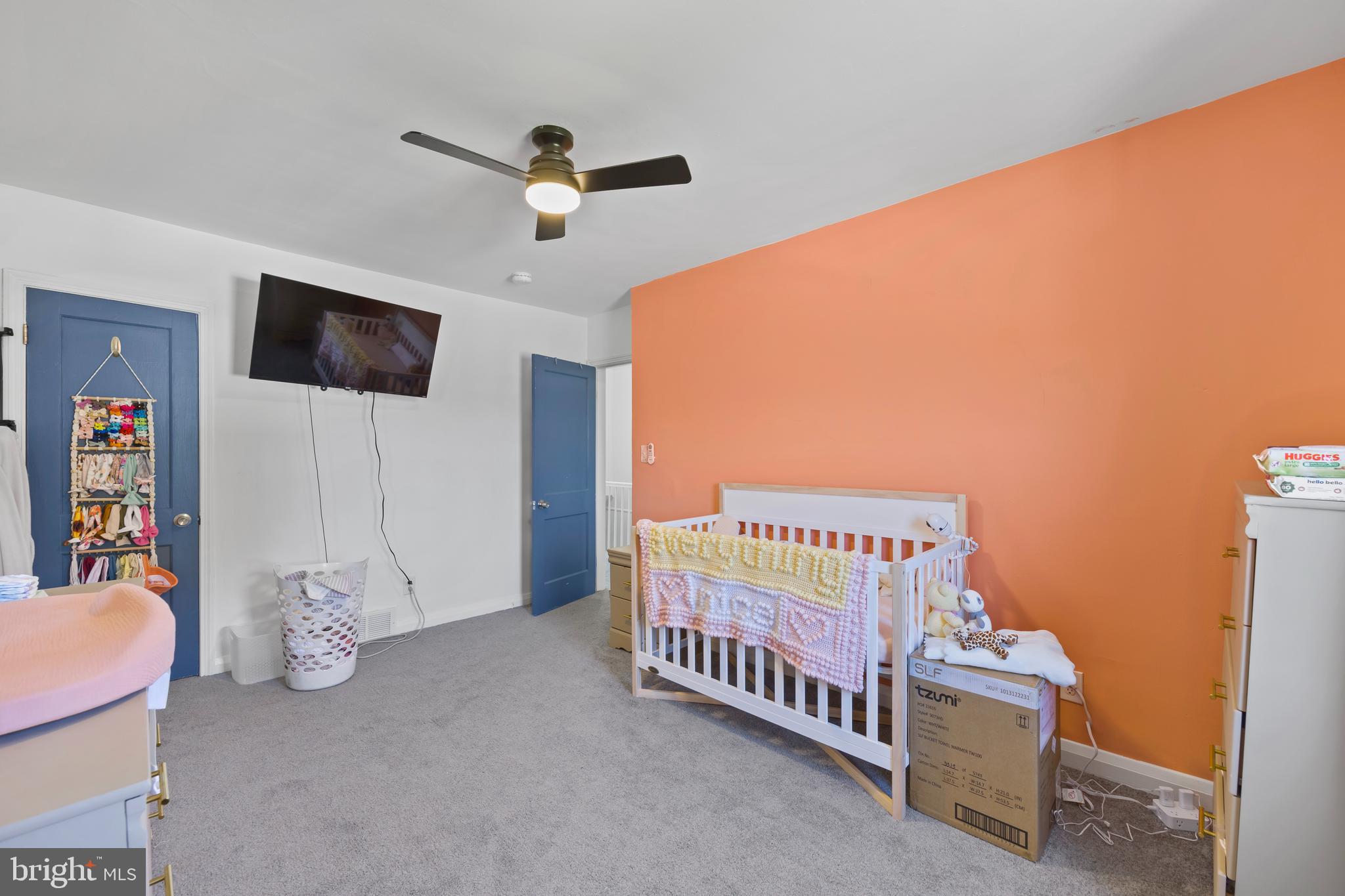 4511 Marble Hall Road Baltimore, MD 21239 - Photo 29 of 48 a view of a room with furniture and a flat screen tv