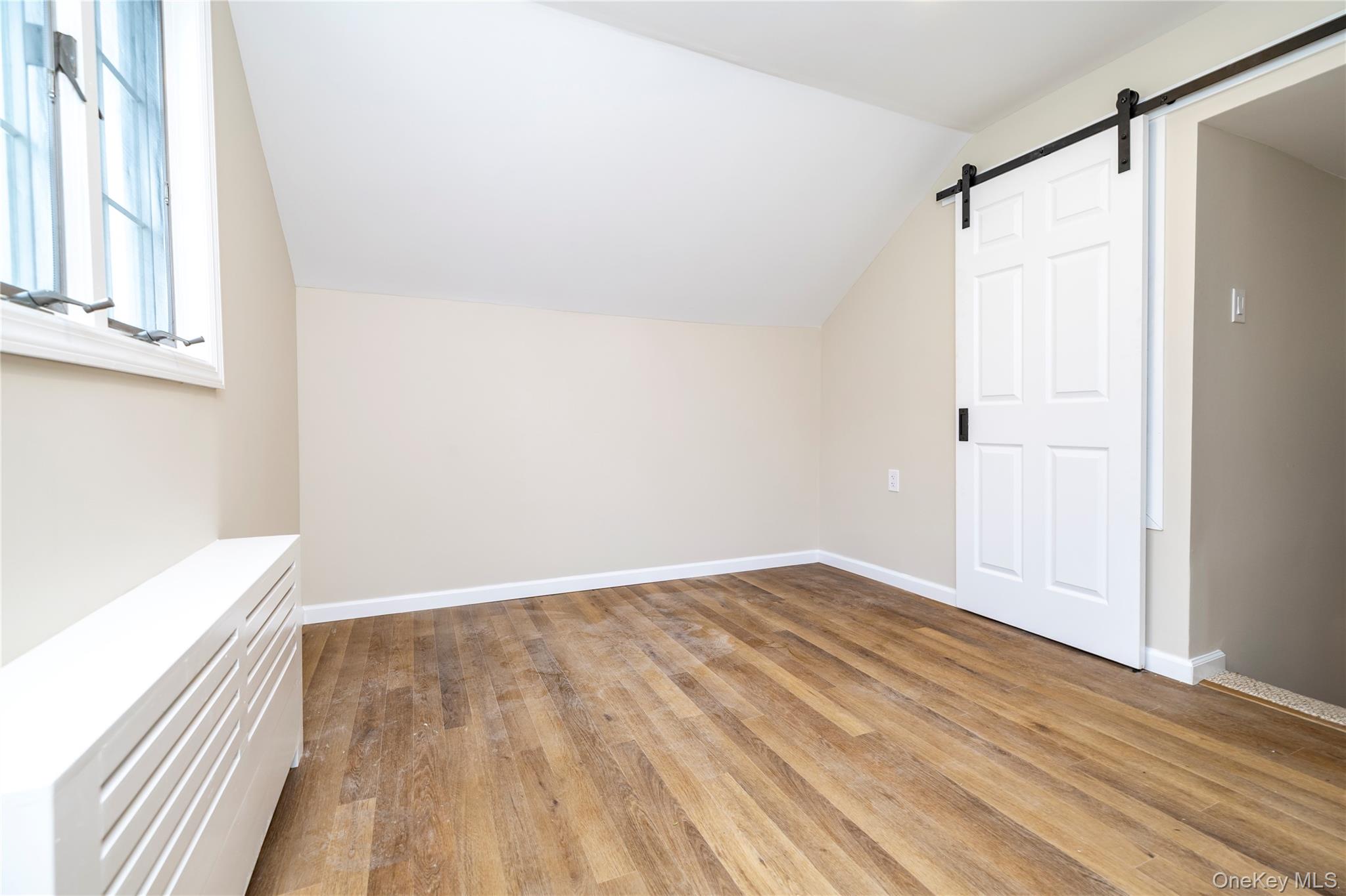 485 Farm Ranch Road West Bethpage, NY 11714 - Photo 20 of 26 Third Bedroom With Barnyard Door/Closet