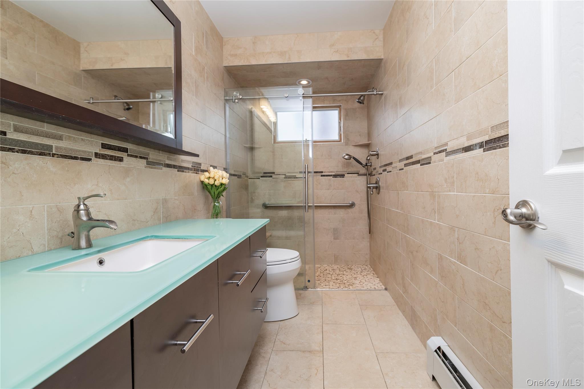 485 Farm Ranch Road West Bethpage, NY 11714 - Photo 21 of 26 Large Full Surround Tiled Bathroom Renovated 3 Years Ago with Glass Shower Doors