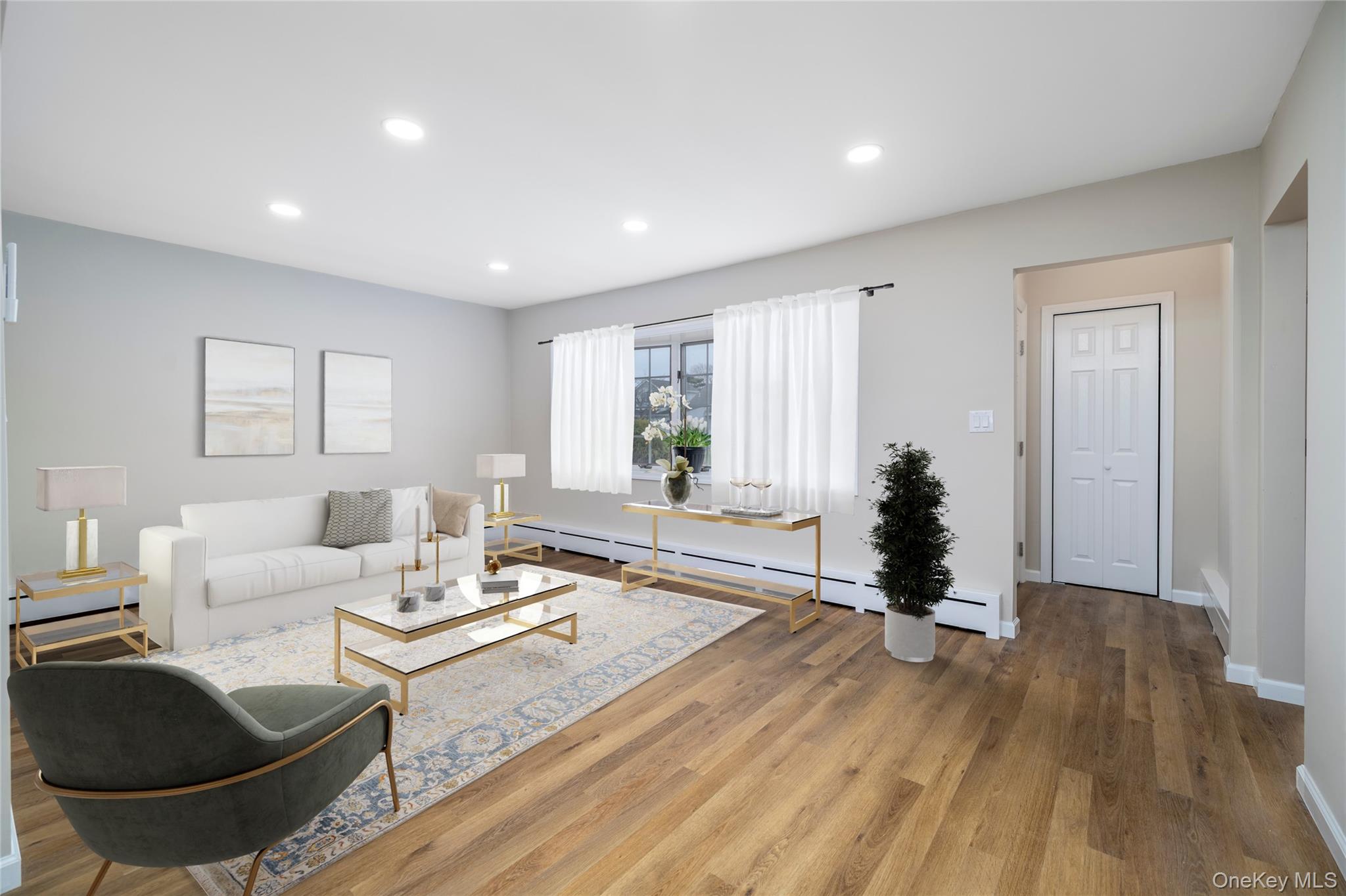 485 Farm Ranch Road West Bethpage, NY 11714 - Photo 4 of 26 Bright and Sunny Newly Renovated Open Living Room to Dining Area, New Vinyl Floors... **Photo Virtually Staged