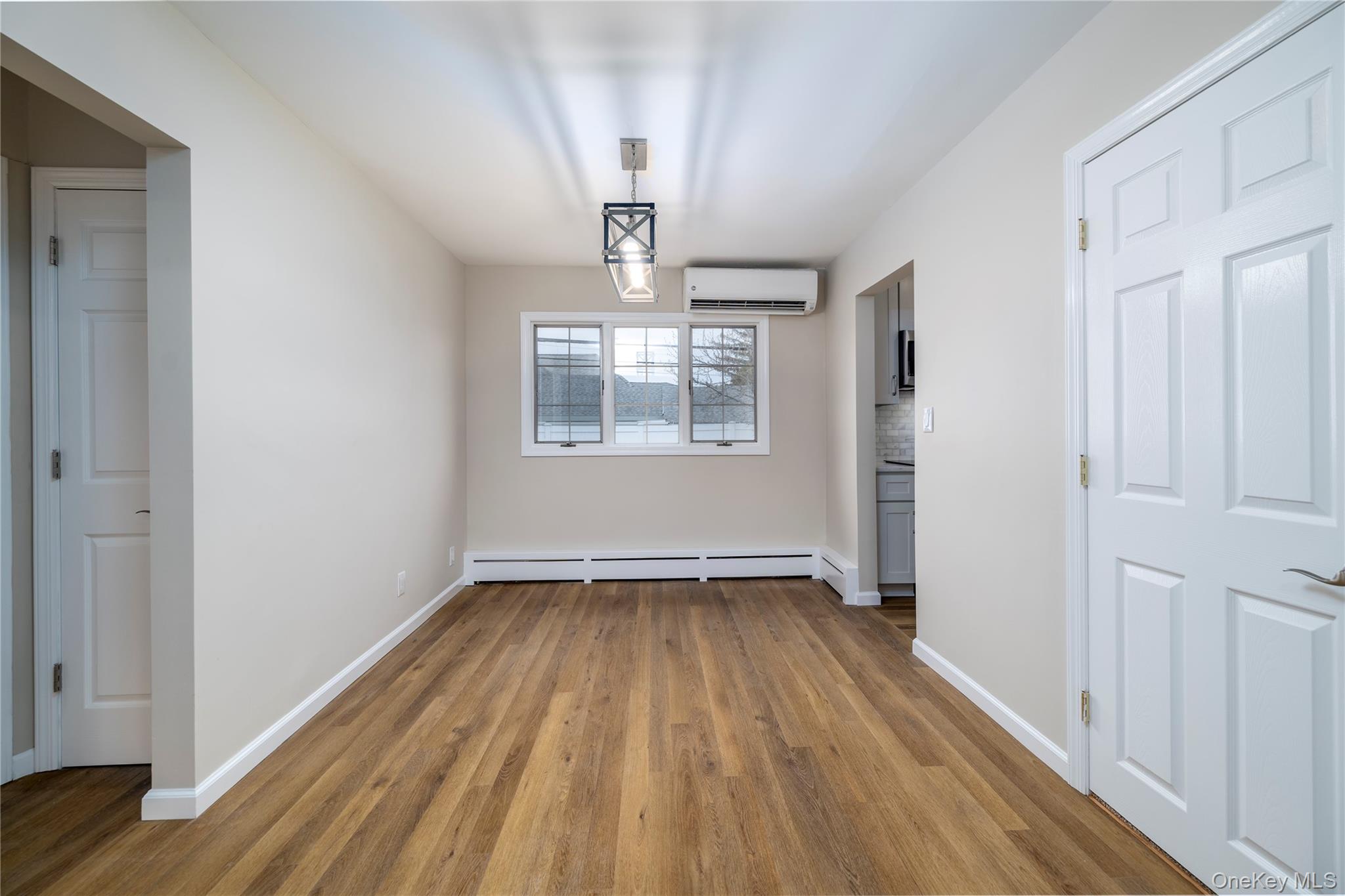 485 Farm Ranch Road West Bethpage, NY 11714 - Photo 9 of 26 Sunny and Bright Formal Dining Area with Split AC Unit