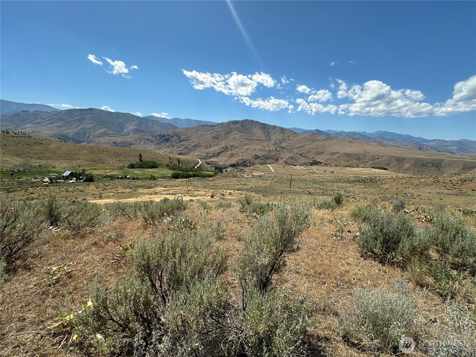 -tbd Peterson Rnch Road Pateros, WA 98846 - Photo 8 of 20 a view of a town with mountains in the background
