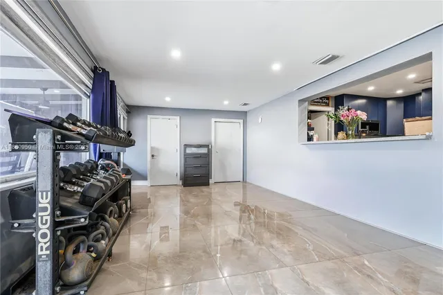 a view of a room with gym equipment