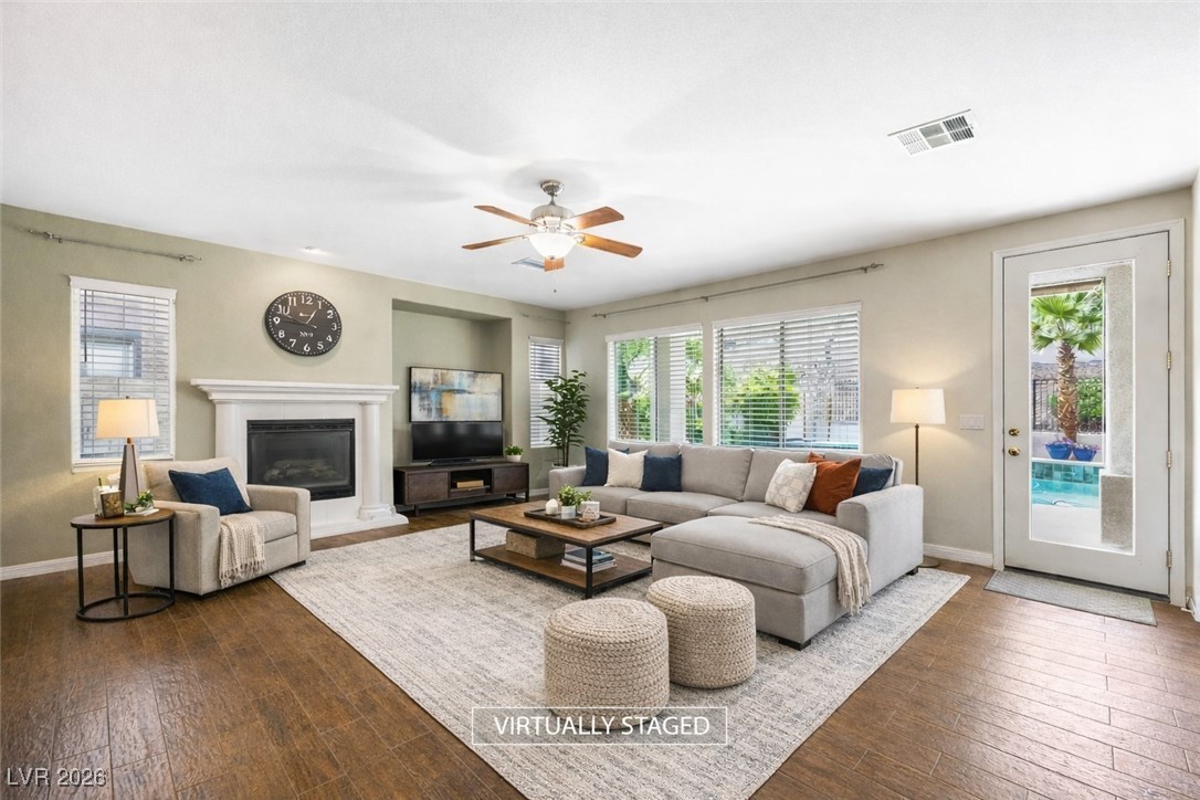 7517 Midnight Rambler Street Las Vegas, NV 89149 - Photo 11 of 68 Virtually staged - family room with a ton of natural light and door leading to the beautiful private backyard/pool