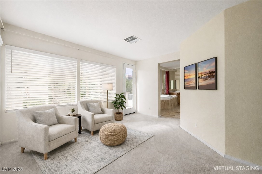 7517 Midnight Rambler Street Las Vegas, NV 89149 - Photo 13 of 68 Virtually staged sitting room off of primary bedroom with door to balcony